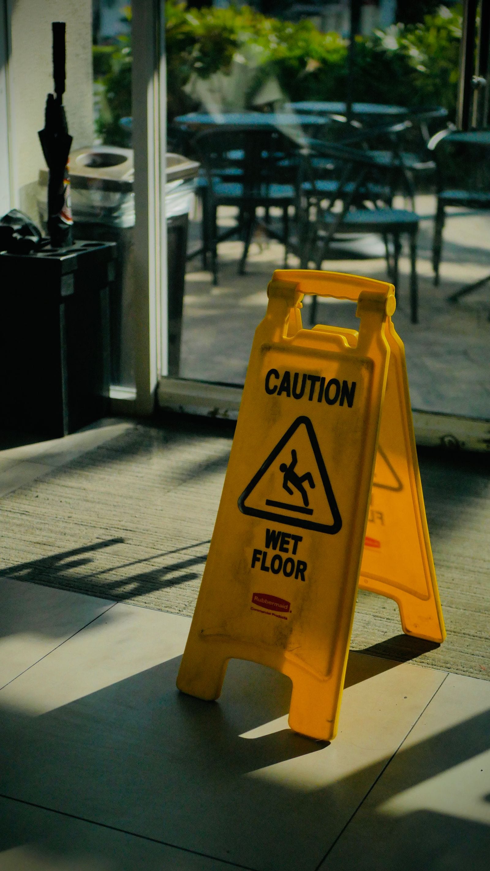 Wet-floor warning sign indoors